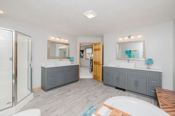 Bathroom, Dual Sink Vanities, Glass Shower, Interior, Wood Texture Flooring