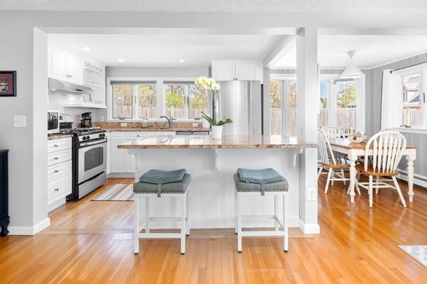 Dining room, Interior, Kitchen, Pendant Lights, Recessed Lighting, Stainless Steel Appliances, Wood Texture Flooring