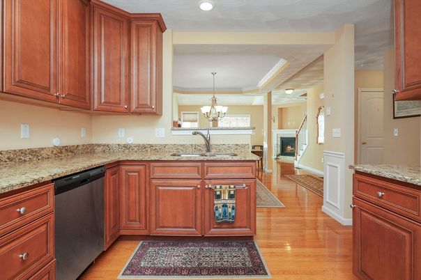 Chandelier, Fireplace, Interior, Kitchen, Recessed Lighting, Wood Texture Flooring