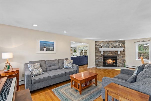 Fireplace, Interior, Living room, Piano, Recessed Lighting, Wood Texture Flooring