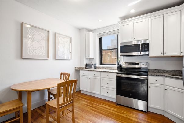 Dining room, Interior, Kitchen, Recessed Lighting, Stainless Steel Appliances, Wood Texture Flooring