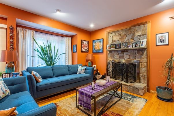 Fireplace, Interior, Living room, Recessed Lighting, Stone Walls, Wood Texture Flooring