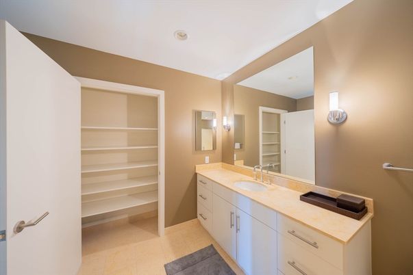 Bathroom, Dual Sink Vanities, Interior, Recessed Lighting, Walk-in Closets