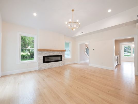 Chandelier, Empty room, Fireplace, Interior, Recessed Lighting, Wood Texture Flooring