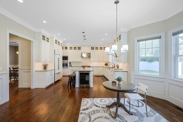 Chandelier, Dining room, Interior, Kitchen, Pendant Lights, Recessed Lighting, Stainless Steel Appliances, Wood Texture Flooring