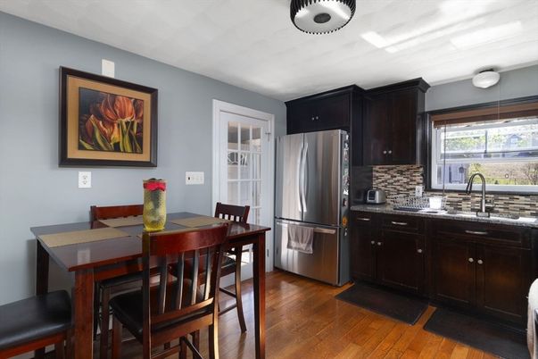 Dining room, Interior, Kitchen, Pendant Lights, Stainless Steel Appliances, Wood Texture Flooring