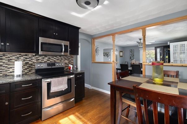 Dining room, Interior, Kitchen, Recessed Lighting, Stainless Steel Appliances, Wood Texture Flooring