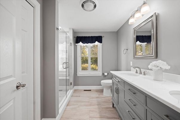 Bathroom, Dual Sink Vanities, Glass Shower, Interior, Wood Texture Flooring