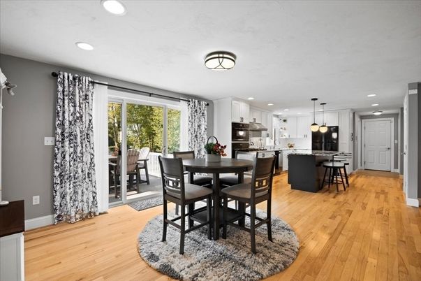 Dining room, Interior, Kitchen, Pendant Lights, Recessed Lighting, Stainless Steel Appliances, Wood Texture Flooring
