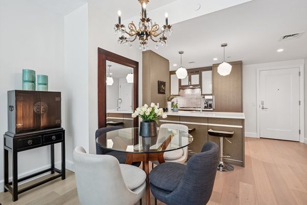 Chandelier, Dining room, Interior, Kitchen, Pendant Lights, Recessed Lighting, Stainless Steel Appliances, Wood Texture Flooring