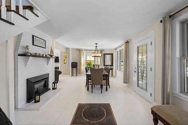 Dining room, Fireplace, Interior, Pendant Lights, Stone Walls, Wood Texture Flooring