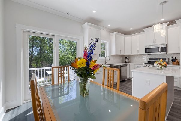 Dining room, Interior, Kitchen, Pendant Lights, Recessed Lighting, Stainless Steel Appliances, Wood Texture Flooring