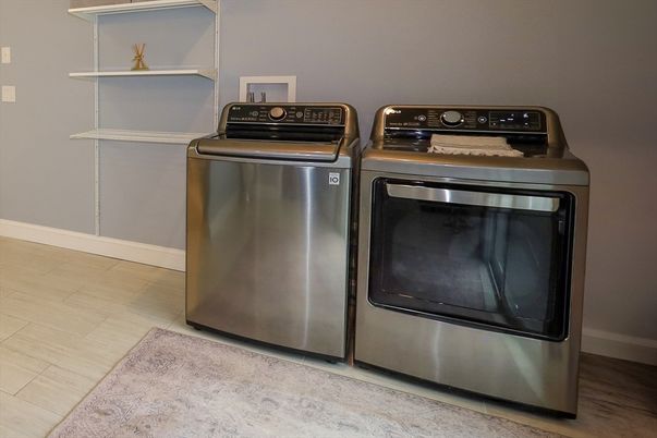Interior, Stainless Steel Appliances, Washer, Wood Texture Flooring
