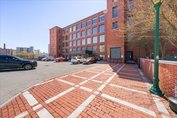 Exterior, Facade, Brick Facade, Condo Building