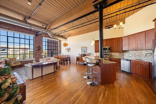 Dining room, Interior, Kitchen, Living room, Pendant Lights, Stainless Steel Appliances, Stone Walls, Wood Texture Flooring