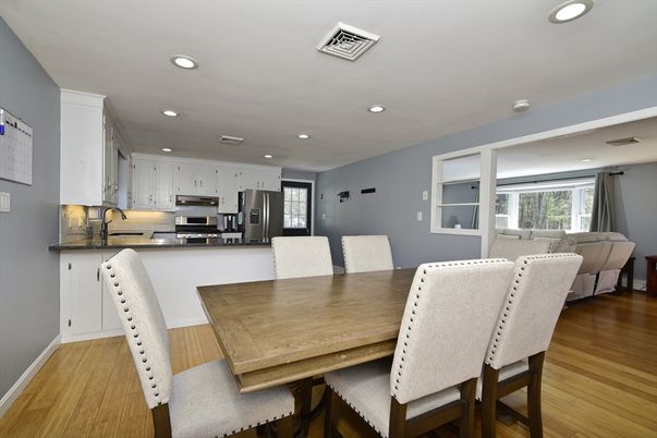 Dining room, Interior, Kitchen, Living room, Recessed Lighting, Stainless Steel Appliances, Wood Texture Flooring