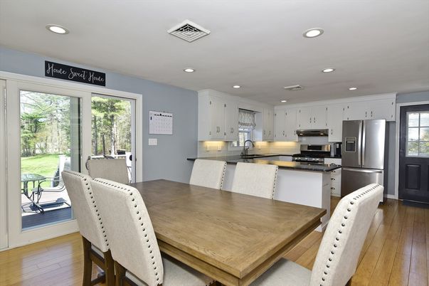 Dining room, Interior, Kitchen, Recessed Lighting, Stainless Steel Appliances, Wood Texture Flooring