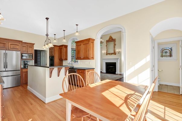 Dining room, Fireplace, Interior, Kitchen, Pendant Lights, Stainless Steel Appliances, Wood Texture Flooring