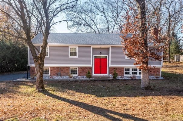 Exterior, Facade, Brick Facade, Raised Ranch