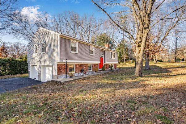 Attached, Backyard, Exterior, Facade, Brick Facade, Raised Ranch