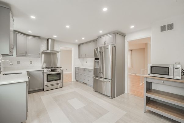 Interior, Kitchen, Recessed Lighting, Stainless Steel Appliances, Wood Texture Flooring