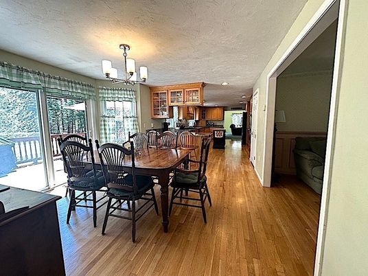 Chandelier, Dining room, Interior, Kitchen, Stainless Steel Appliances, Wood Texture Flooring