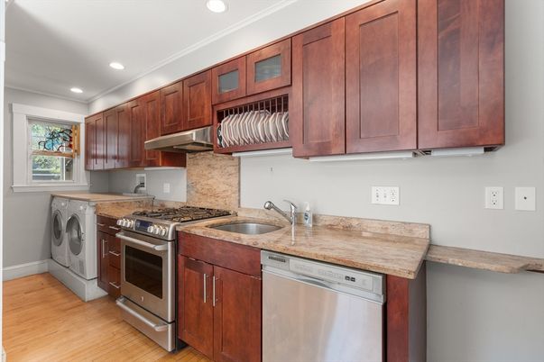 Interior, Kitchen, Recessed Lighting, Washer, Wood Texture Flooring