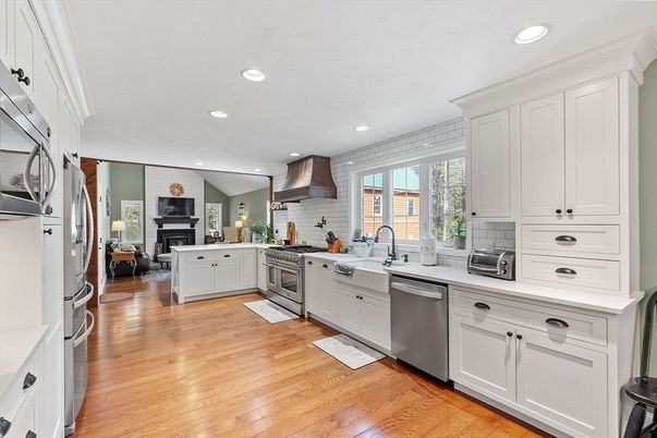 Fireplace, Interior, Kitchen, Recessed Lighting, Stainless Steel Appliances, Wood Texture Flooring