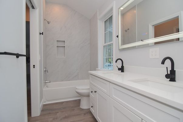 Bathroom, Dual Sink Vanities, Interior, Marble Walls, Wood Texture Flooring