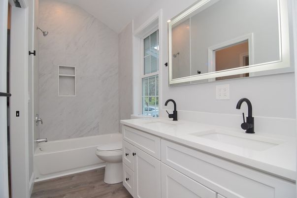 Bathroom, Dual Sink Vanities, Interior, Marble Walls, Wood Texture Flooring