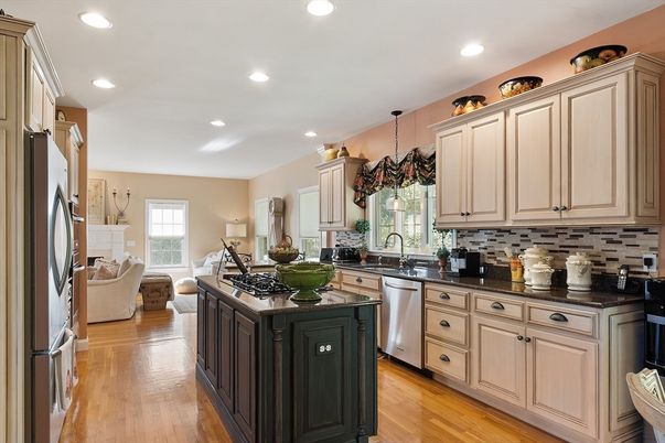 Chandelier, Interior, Kitchen, Living room, Recessed Lighting, Stainless Steel Appliances, Wood Texture Flooring