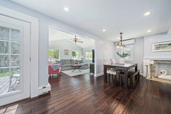 Dining room, Fireplace, Interior, Living room, Pendant Lights, Recessed Lighting, Wood Texture Flooring