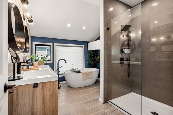Bathroom, Dual Sink Vanities, Free Standing Baths, Glass Shower, Interior, Recessed Lighting, Wood Texture Flooring