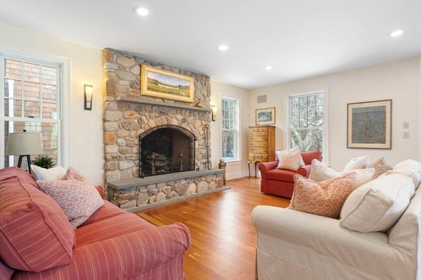 Fireplace, Interior, Living room, Recessed Lighting, Stone Walls, Wood Texture Flooring