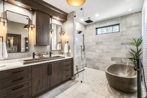 Bathroom, Dual Sink Vanities, Free Standing Baths, Glass Shower, Interior, Pendant Lights, Recessed Lighting, Stone Walls