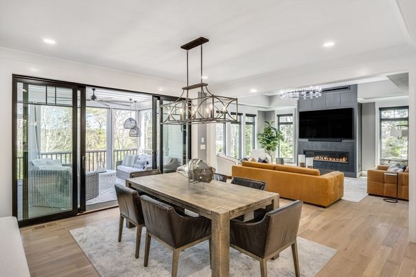 Dining room, Fireplace, Interior, Living room, Pendant Lights, Recessed Lighting, Wood Texture Flooring
