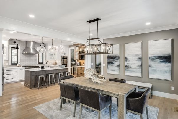 Dining room, Interior, Kitchen, Pendant Lights, Recessed Lighting, Stainless Steel Appliances, Wood Texture Flooring