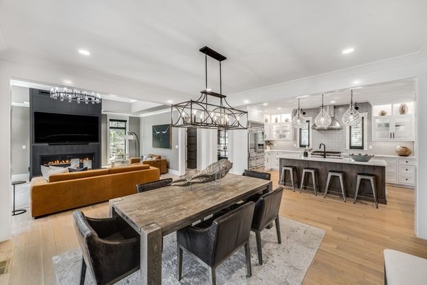 Dining room, Fireplace, Interior, Kitchen, Living room, Pendant Lights, Recessed Lighting, Stainless Steel Appliances, Wood Texture Flooring
