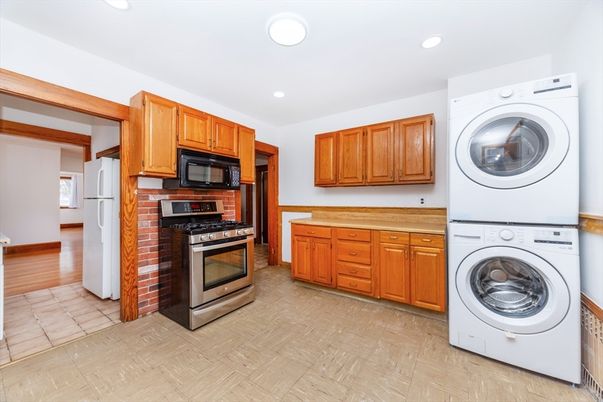 Interior, Kitchen, Recessed Lighting, Utility Closets, Washer, Wood Texture Flooring