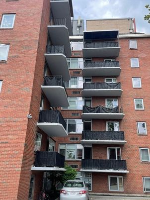 Exterior, Facade, Brick Facade, Condo Building