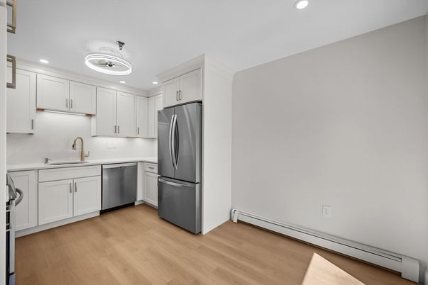 Interior, Kitchen, Recessed Lighting, Stainless Steel Appliances, Wood Texture Flooring