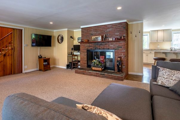 Fireplace, Interior, Kitchen, Living room, Recessed Lighting, Stone Walls, Wood Texture Flooring