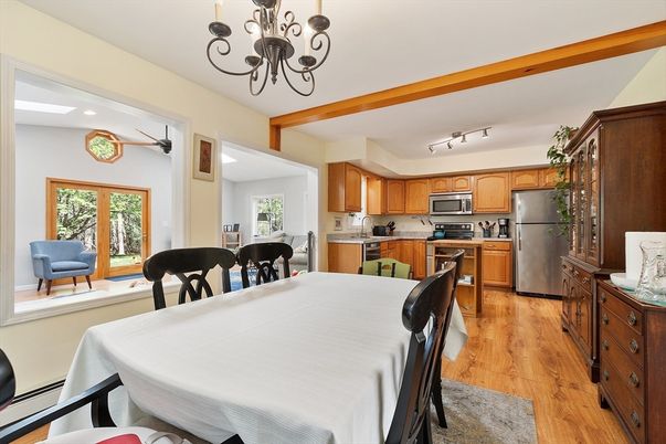 Chandelier, Dining room, Interior, Kitchen, Recessed Lighting, Stainless Steel Appliances, Wood Texture Flooring