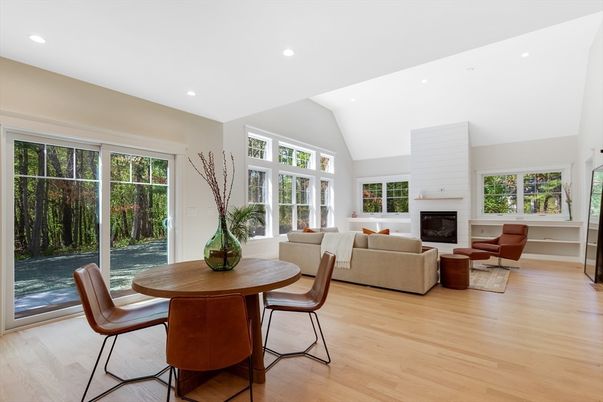 Dining room, Fireplace, Interior, Living room, Recessed Lighting, Wood Texture Flooring