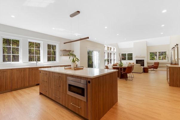 Dining room, Fireplace, Interior, Kitchen, Living room, Pendant Lights, Recessed Lighting, Stainless Steel Appliances, Wood Texture Flooring