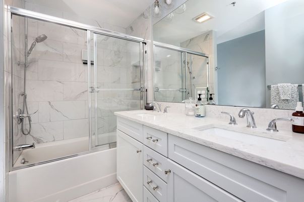 Bathroom, Dual Sink Vanities, Glass Shower, Interior, Marble, Marble Walls, Recessed Lighting