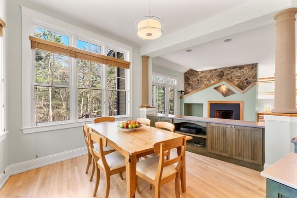 Dining room, Fireplace, Interior, Pendant Lights, Stone Walls, Wood Texture Flooring