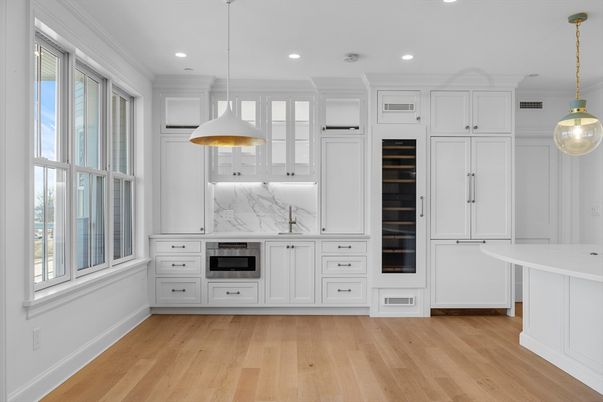 Interior, Kitchen, Marble Walls, Pendant Lights, Recessed Lighting, Wood Texture Flooring