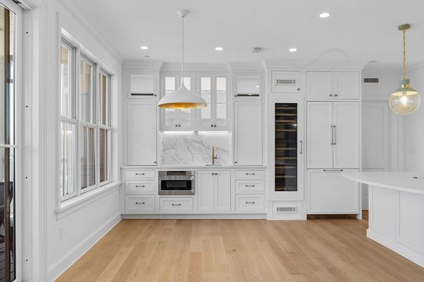 Interior, Kitchen, Marble Walls, Pendant Lights, Recessed Lighting, Wood Texture Flooring