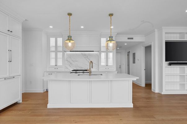 Interior, Kitchen, Marble Walls, Pendant Lights, Recessed Lighting, Stainless Steel Appliances, Wood Texture Flooring